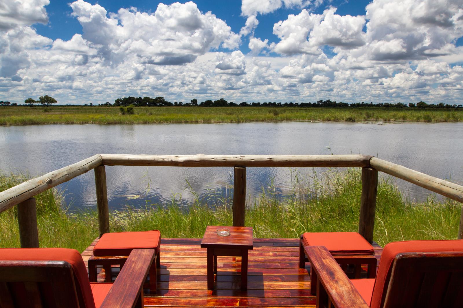 Deck overlooking the water - Kwando Lagoon Camp