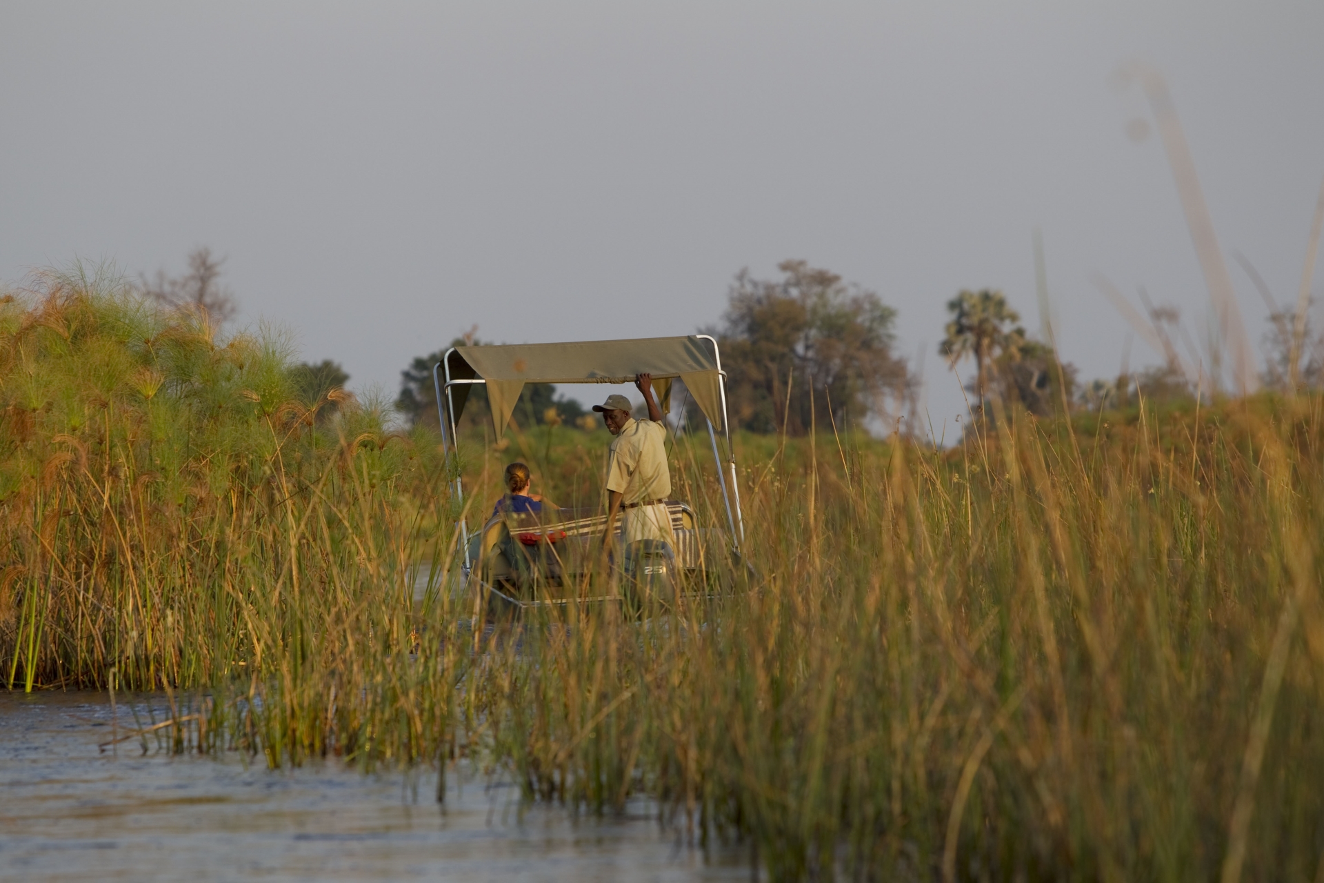 Boat trip on channels - Essential Botswana